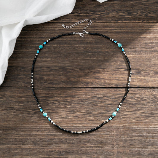 black and  turquoise shell style necklace